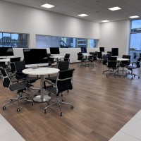 Aura executive medium back with 900mm diamter tops and brushed steel base